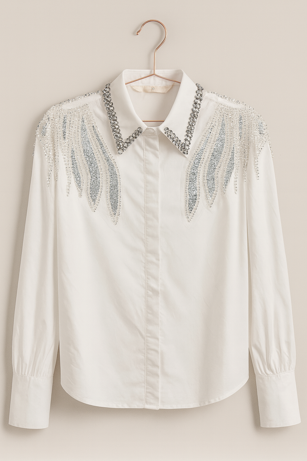 White long-sleeved shirt with sequin and pearl appliqués
