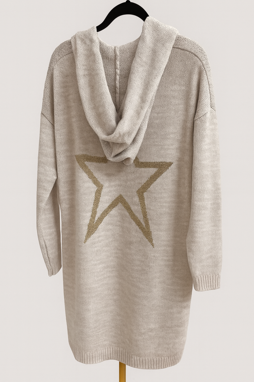 Beige cardigan with star on the back