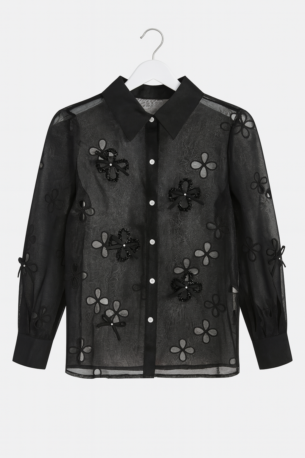 Black sheer blouse with bows and flower