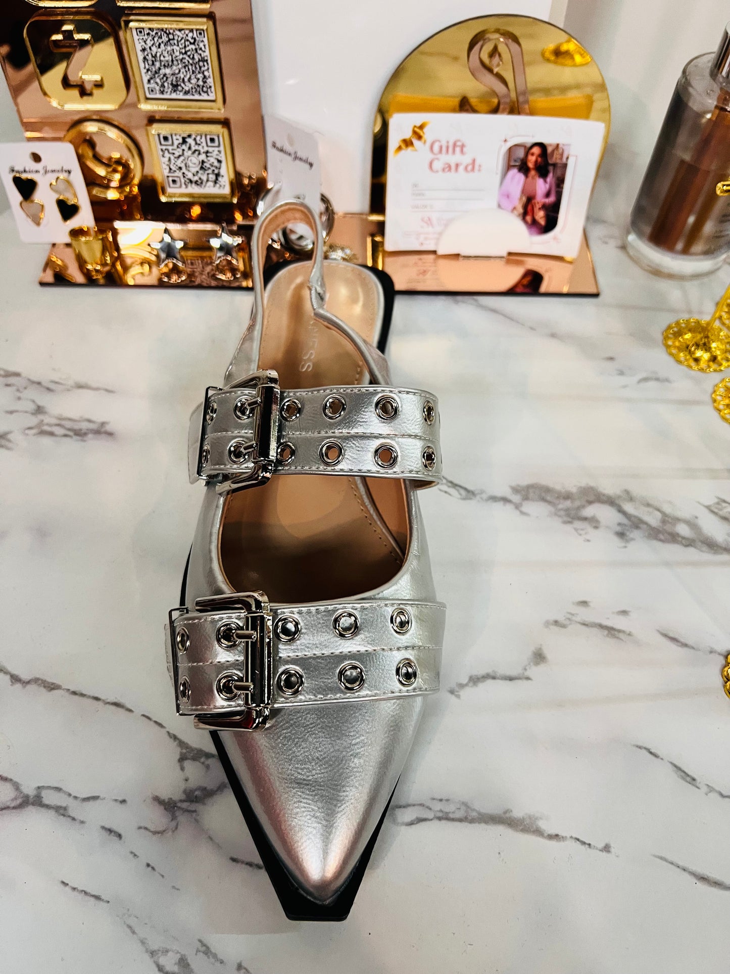 Brown pointed sneaker with silver studs