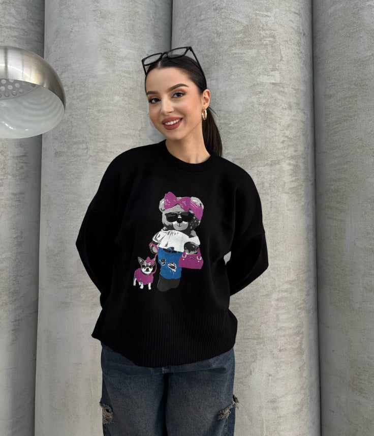 white sweater with teddy bear