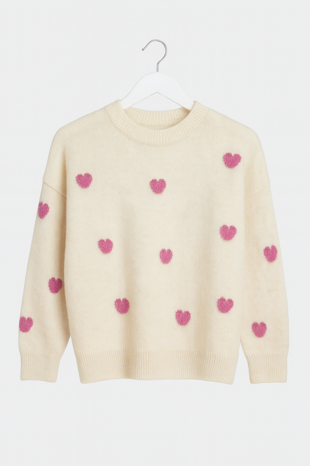 Beige sweater with pink hearts