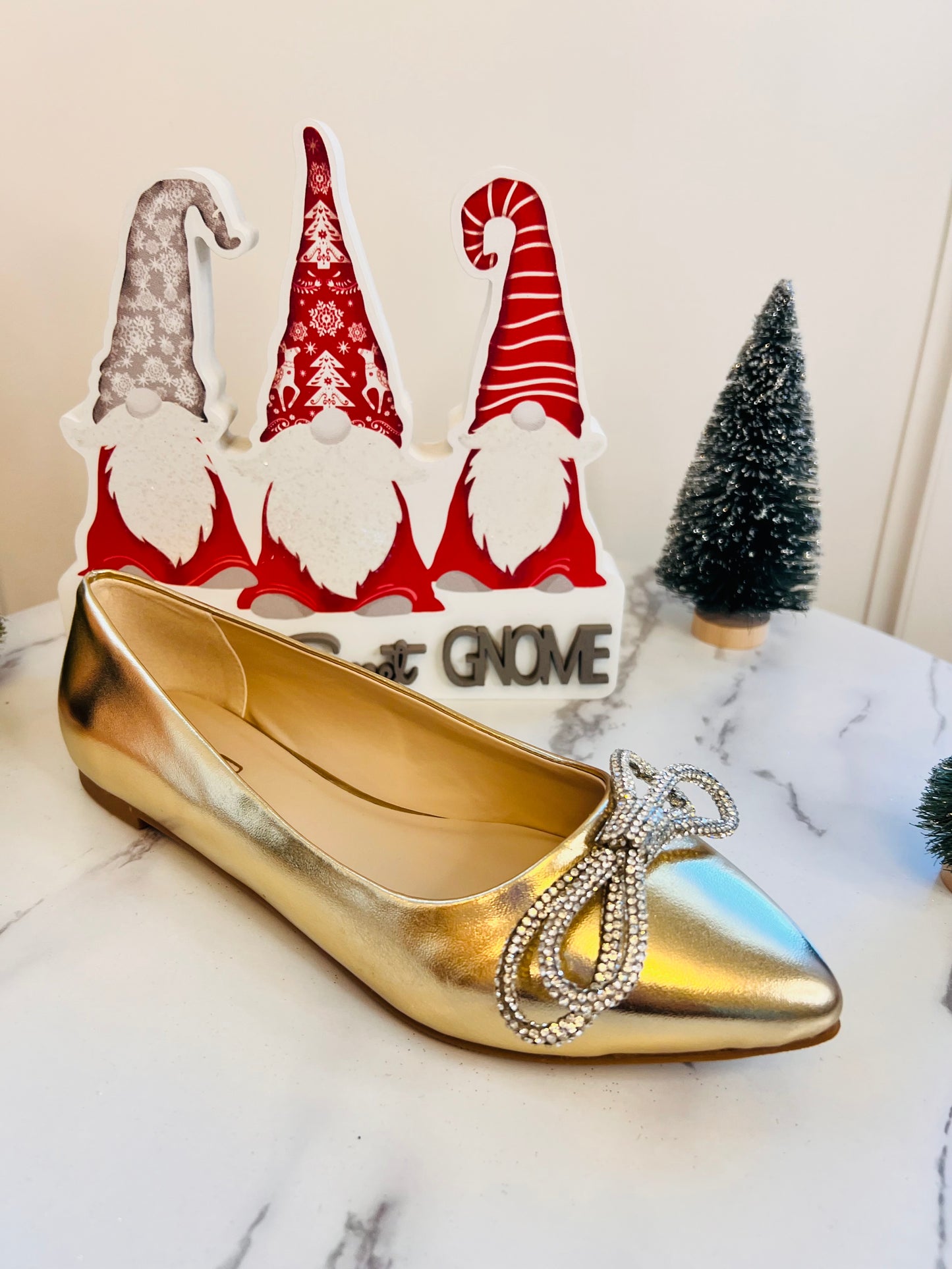 Candy-22 Gold pointed toe sneaker with rhinestone bow