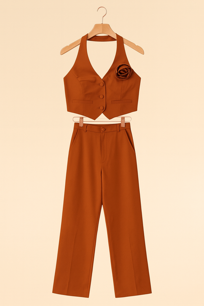 Black set top open at back and flower in the same fabric